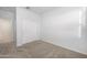 Carpeted bedroom featuring a closet with sliding doors and neutral paint at 11626 E Yeager Cyn, Gold Canyon, AZ 85118