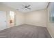 Spacious bedroom with carpet flooring, ceiling fan, and natural light from the window at 11626 E Yeager Cyn, Gold Canyon, AZ 85118