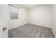 This bedroom offers neutral paint, carpet, and a window with blinds at 11626 E Yeager Cyn, Gold Canyon, AZ 85118