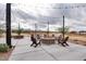 Community firepit area with comfortable seating, ambient lighting, and desert landscaping at 11626 E Yeager Cyn, Gold Canyon, AZ 85118