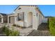 Inviting single story home with covered front porch, desert landscaping, and two car garage at 11626 E Yeager Cyn, Gold Canyon, AZ 85118