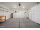 Spacious garage featuring built in cabinets and shelving for storage at 11626 E Yeager Cyn, Gold Canyon, AZ 85118