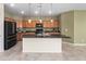 Spacious kitchen boasts an island, modern appliances, and ample cabinet space for storage at 11626 E Yeager Cyn, Gold Canyon, AZ 85118