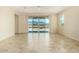 Bright, open living room featuring tile flooring and sliding glass doors with views at 11626 E Yeager Cyn, Gold Canyon, AZ 85118