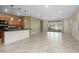 Open layout with kitchen, dining, and living space; lots of light and desert views at 11626 E Yeager Cyn, Gold Canyon, AZ 85118