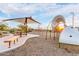 Community playground featuring slides, climbing structures, benches, and shaded seating at 11626 E Yeager Cyn, Gold Canyon, AZ 85118