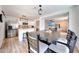 Open-concept dining area connecting to a modern kitchen and spacious living area, perfect for gatherings at 13443 W Post Dr, Surprise, AZ 85374