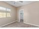 Bright bedroom with carpet, large window, and walk-in closet at 1367 S Country Club Dr # 1320, Mesa, AZ 85210