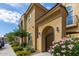 Beautiful two-story home with well-maintained landscaping and a charming gated front entrance at 1367 S Country Club Dr # 1320, Mesa, AZ 85210