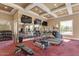 Well-equipped gym featuring treadmills, weights, and mounted TVs for an optimal workout experience at 1367 S Country Club Dr # 1320, Mesa, AZ 85210