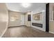 Spacious living room with a modern electric fireplace and decorative tile surround creates a cozy focal point at 1367 S Country Club Dr # 1320, Mesa, AZ 85210