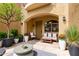 Charming patio area features cozy seating, potted plants, and an inviting outdoor space at 1367 S Country Club Dr # 1320, Mesa, AZ 85210
