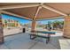 Shaded picnic area with a table and view of the playground, offering a spot for outdoor Gathering fun at 1367 S Country Club Dr # 1320, Mesa, AZ 85210