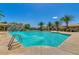 Large community pool with a water feature and convenient ladder access for a refreshing swim at 1367 S Country Club Dr # 1320, Mesa, AZ 85210