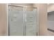 A clean, bright bathroom featuring a glass enclosed shower with modern fixtures at 1367 S Country Club Dr # 1320, Mesa, AZ 85210