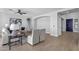 Inviting living room with modern decor, archways, and lots of natural light at 1526 E Glacier Pl, Chandler, AZ 85249