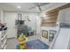 Bedroom features bunk bed, closet, dresser, and gray wood laminate flooring at 156 N Hawes Rd # 68, Mesa, AZ 85207