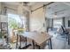 Cozy dining area with modern table and décor, connected to the living space at 156 N Hawes Rd # 68, Mesa, AZ 85207