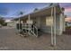 Mobile home featuring an inviting covered porch and ample parking at 156 N Hawes Rd # 68, Mesa, AZ 85207