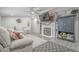 Comfortable living room showcasing a fireplace, large TV, and modern furnishings at 156 N Hawes Rd # 68, Mesa, AZ 85207