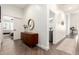 Inviting hallway featuring modern decor and a stylish accent table at 16023 S 30Th Pl, Phoenix, AZ 85048