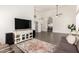 Open living area showcasing modern décor and hardwood floors at 16023 S 30Th Pl, Phoenix, AZ 85048
