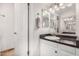Clean bathroom features a vanity, sink and lighting plus a separate door to the toilet and shower at 17616 N 20Th Dr, Phoenix, AZ 85023