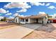 A charming single-story home featuring a covered carport and low-maintenance landscaping at 17616 N 20Th Dr, Phoenix, AZ 85023