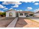 Charming single-story home featuring a covered carport and low-maintenance landscaping at 17616 N 20Th Dr, Phoenix, AZ 85023