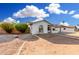 A charming single story home with a front yard with low maintenance landscaping at 17616 N 20Th Dr, Phoenix, AZ 85023
