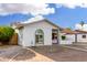 A charming single story home with a front yard with low maintenance landscaping at 17616 N 20Th Dr, Phoenix, AZ 85023