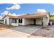 A charming single-story home featuring a covered carport and low-maintenance landscaping at 17616 N 20Th Dr, Phoenix, AZ 85023
