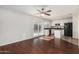 Bright kitchen with hardwood floors, a center island, stainless appliances and sliding glass door access to the backyard at 17616 N 20Th Dr, Phoenix, AZ 85023
