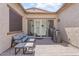 Outdoor patio with seating and barbecue, perfect for entertaining or relaxing at 1895 N 141St Ave, Goodyear, AZ 85395