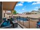A beautiful backyard with a private pool and a covered patio with comfortable seating at 20440 N 39Th Dr, Glendale, AZ 85308