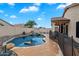This beautiful pool features rock features and a lush desert landscape at 20440 N 39Th Dr, Glendale, AZ 85308