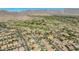 Expansive aerial view of the golf course community features homes with private pools, and desert landscaping at 20585 W Garden St, Buckeye, AZ 85396