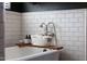 Claw foot bathtub featuring chrome fixtures and tiled walls at 20585 W Garden St, Buckeye, AZ 85396