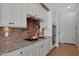 Modern kitchen featuring granite counters and stainless steel appliances at 20585 W Garden St, Buckeye, AZ 85396