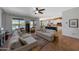 Open-concept living space with clear view of the pool and an adjacent modern kitchen at 20585 W Garden St, Buckeye, AZ 85396