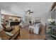 Spacious open-concept living area with ample seating and seamless kitchen access at 20585 W Garden St, Buckeye, AZ 85396