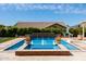 Backyard pool with water features, beautiful landscaping and a basketball hoop at 20585 W Garden St, Buckeye, AZ 85396