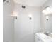 Bathroom has gray walls with two light fixtures and a white single sink vanity at 2127 W San Miguel Ave, Phoenix, AZ 85015