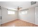 Vacant bedroom with light-colored walls, and wood-look flooring at 2127 W San Miguel Ave, Phoenix, AZ 85015