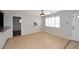 Inviting dining room with hardwood floors, and a stylish pendant light fixture at 2127 W San Miguel Ave, Phoenix, AZ 85015