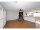 Bright living space with a unique fireplace, plantation shutters, and modern lighting at 2127 W San Miguel Ave, Phoenix, AZ 85015