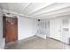 This storage room has painted brick walls and a concrete floor at 2127 W San Miguel Ave, Phoenix, AZ 85015