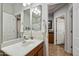 Bathroom showcasing a vanity with a large mirror and tiled floors at 2328 W Calle Marita --, Phoenix, AZ 85085