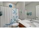 Bright bathroom featuring a shower-tub combo with modern fixtures and vanity at 2328 W Calle Marita --, Phoenix, AZ 85085