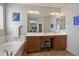 Bathroom boasts a double sink vanity with a separate makeup vanity and a relaxing soaking tub at 2328 W Calle Marita --, Phoenix, AZ 85085
